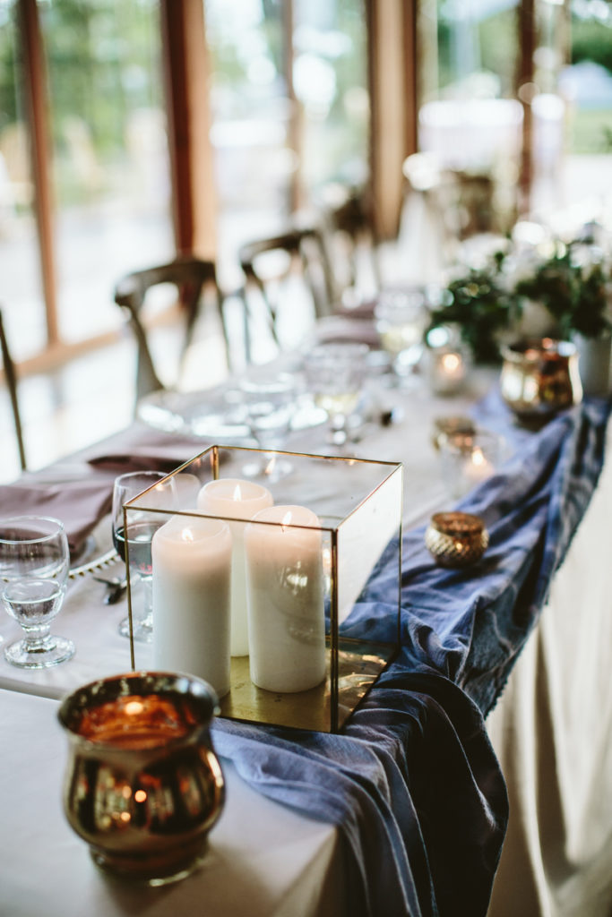 glass box with candles