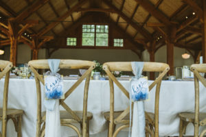 crossback chairs with mr and mrs sign